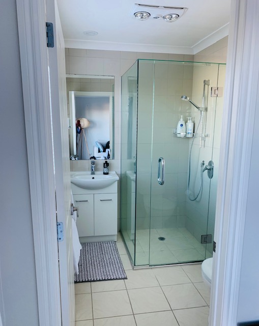 Private bathroom vanity and mirror.